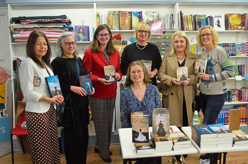 PICTURE: Former colleagues of Tipperary author support her at book signing