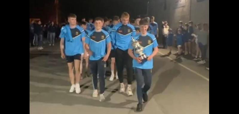WATCH: Crowds descend on Holycross to welcome home minor heroes