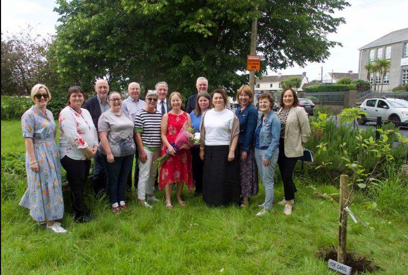 Carrick-on-Suir Library manager's retirement marked by planting of apple tree