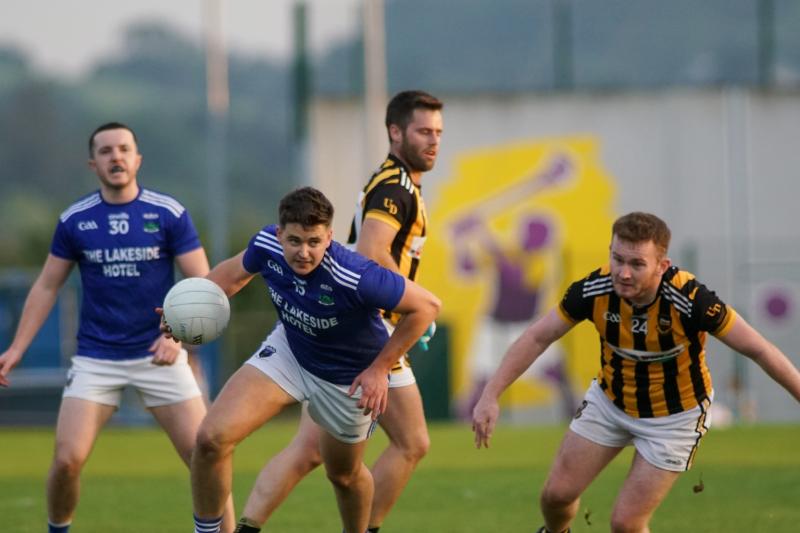 Ballina leave it late but strike two clinical goals to top group and knock out Upperchurch