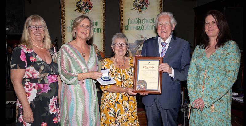 Dilligent Tipperary Comhaltas volunteer is recognised for her significant contribution