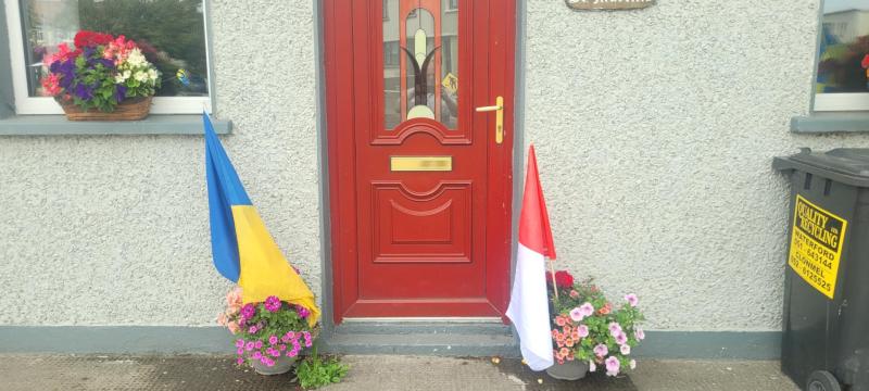 PICTURES: Locals show support for their counties on bordering towns of Tipperary and Cork