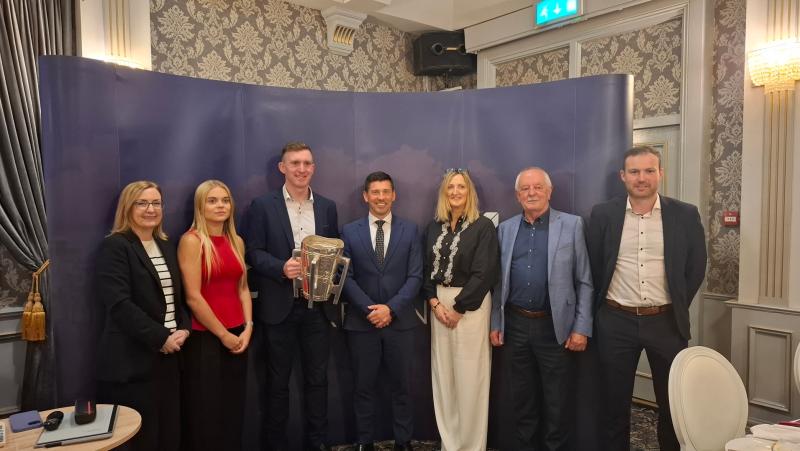 PICTURE: Tipperary hurling hero takes Liam MacCarthy cup to business breakfast