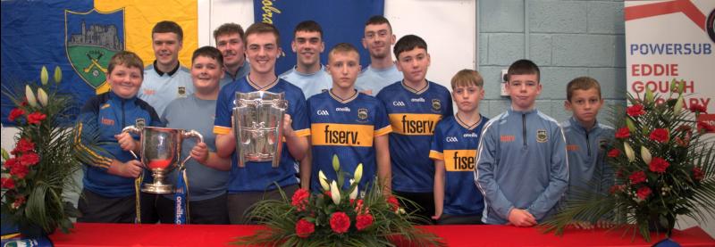 Carrick-on-Suir school honours hurling star past pupils during visit with All-Ireland cups 