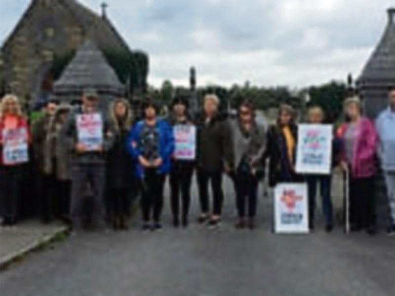 Protest stops work on erection of barriers to prevent cars entering Clonmel cemetery 