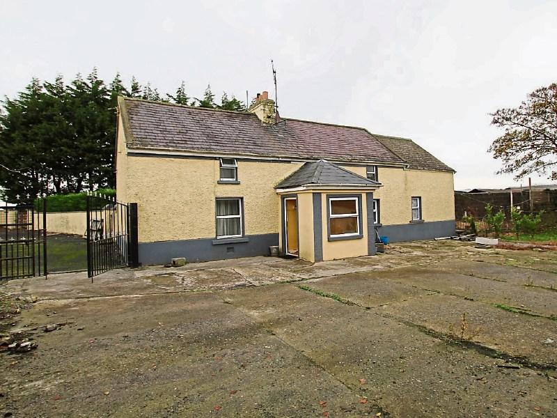Excellent Tipperary farmhouse and commercial yard for sale at Gortnahoe