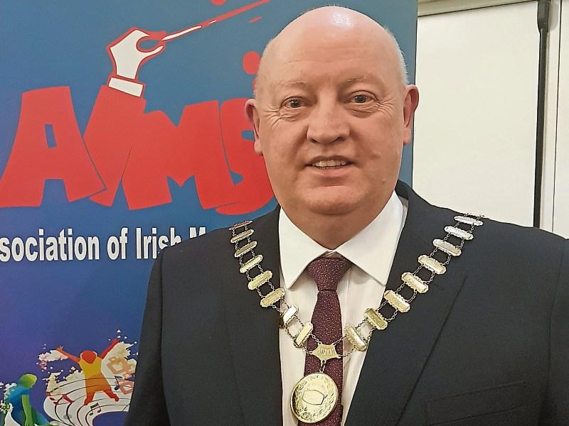 Re-elected president of AIMS