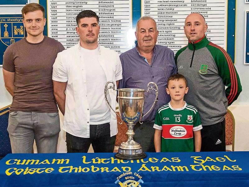 Carrick Swans and Mullinahone captains