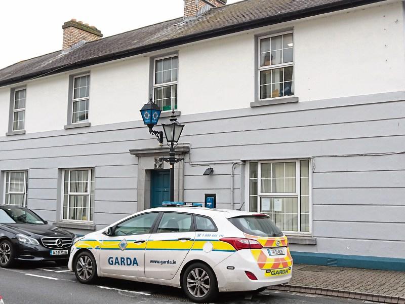 Masked gang slash tyres of garda cars in Co. Tipperary town before breaking into betting shop 