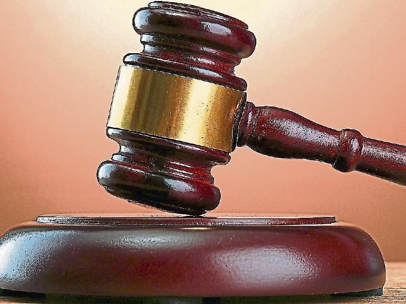 Tipperary man smashed property in shop and walked towards garda holding axe over his head, Circuit Court told 