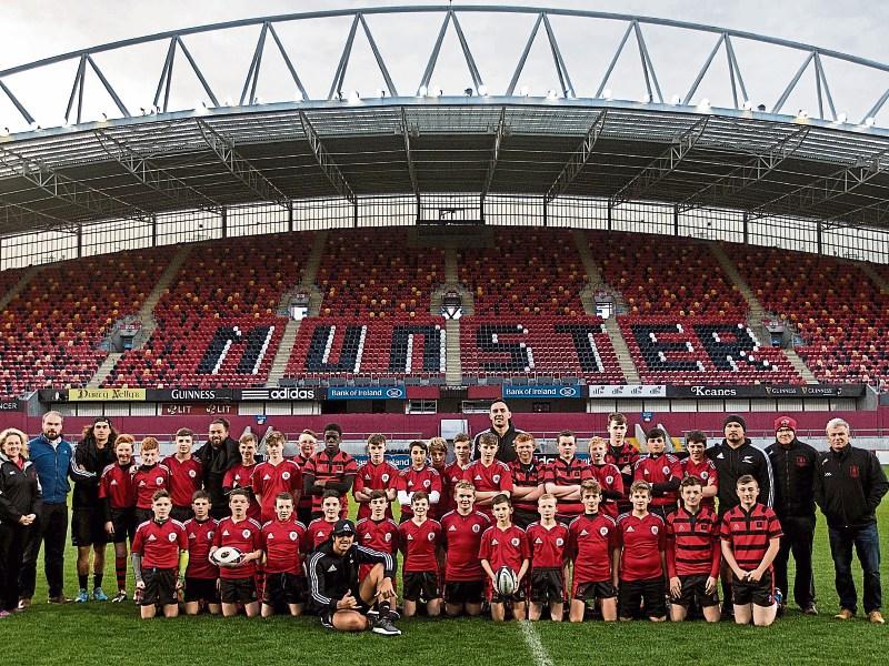 Clonmel students teach hurling skills to the Maori All Blacks