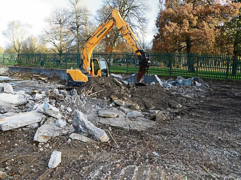 Bulldozers start work on dismantling Templemore pool for new 'flower garden'
