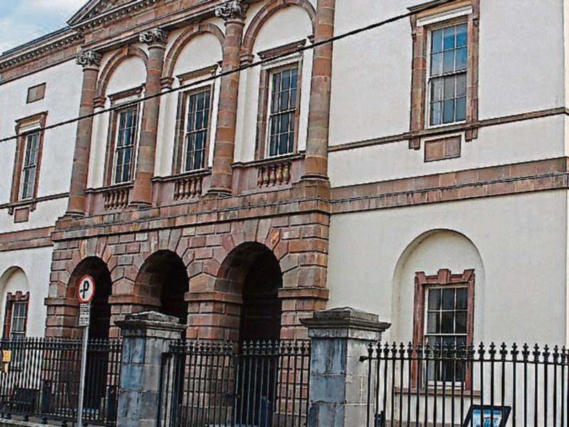 Woman appears before court charged in connection with Clonmel shop robbery 