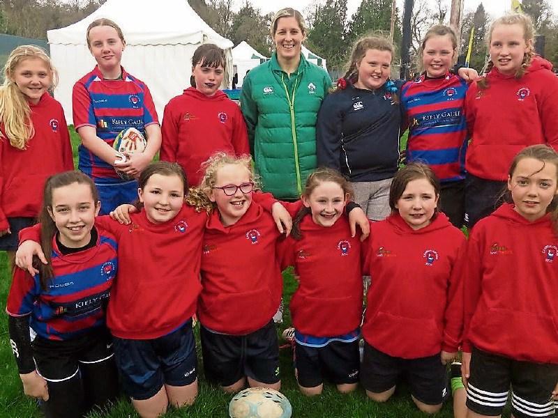 Carrick-on-Suir RFC girls pictured with Irish rugby international Alison Miller at the Aviva Minis Rugby Festival at Carton House.