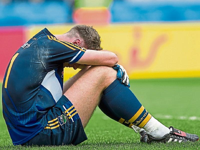 Disappointing Tipp footballers go under to Cork