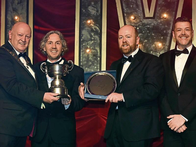 Ray Nolan of Carrick-on-Suir Musical Society receiving the AIMS Best Overall Show runner up award on behalf of the Society.
