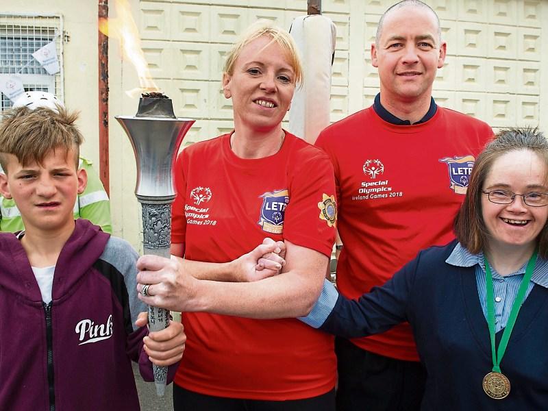 Big welcome for Special Olympics torch at New Inn primary school