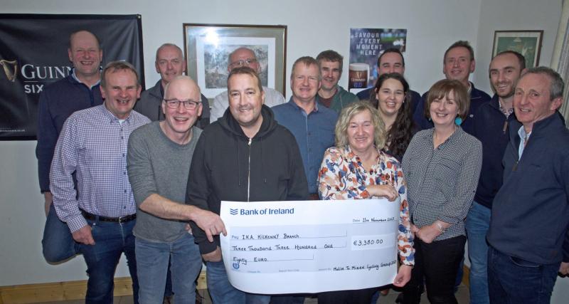 Malin to Mizen Head cycle proceeds presented to Irish Kidney Association at pub near Carrick-on-Suir