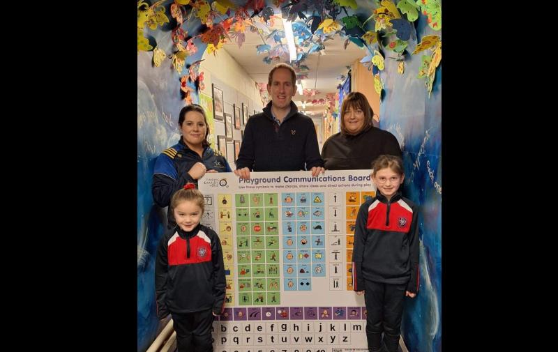 Réalta Sports Club donates communications boards to Carrick-on-Suir primary schools 