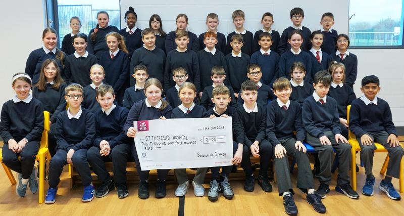 New Tipperary primary schoolchildren present their fundraising cheque to local hospital