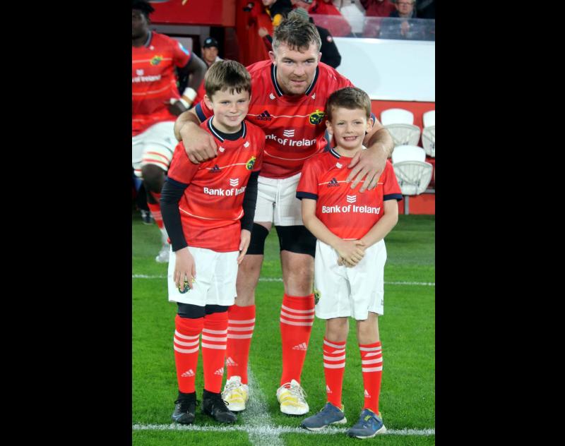 PICTURE: Young supporter from Moycarkey joins Munster captain for a pre-match photo in Thomond Park