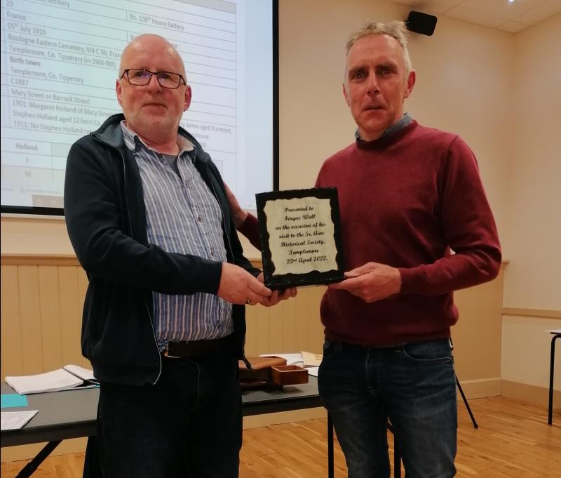  Paddy Quinn presenting a slate to Fergus Wall in appreciation of his work.