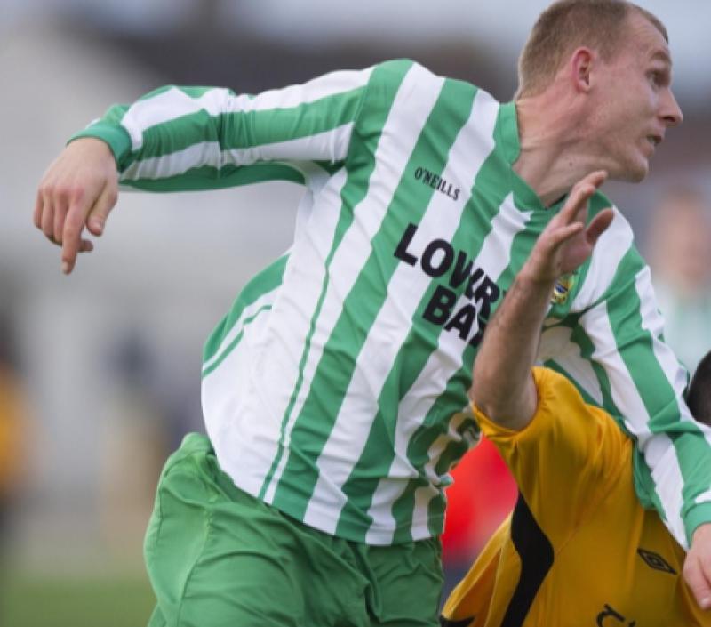 Paul Breen, St. Michaels, FAI Junior International Player of the Year.In this action shot the Saints centre-half comes to grips with Emmet Johnson (Clonmel Town).