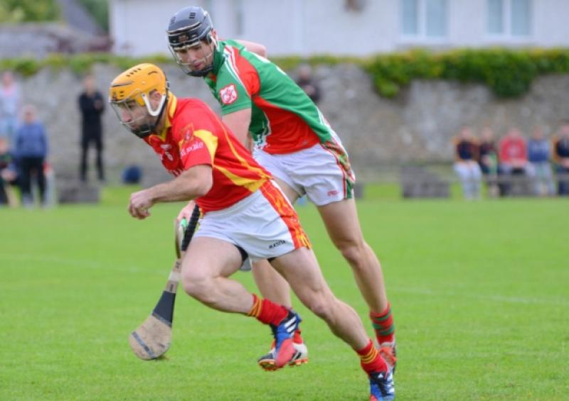 Killenaule defender Kieran Bergin comes clear with the ball ahead of the challenge of Mullinahones Alan Curran in the South SHC semi-final at Fethard.