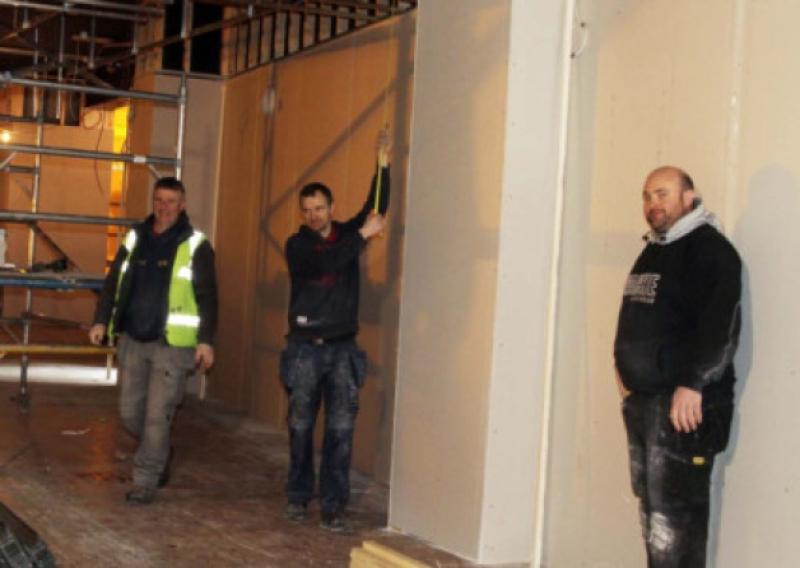 Workers from Intershop Retail Design & Shopfitting from Northern Ireland busy at work refitting the interior of Gough O Keeffe and Naughtons  Picture: Bridget Delaney