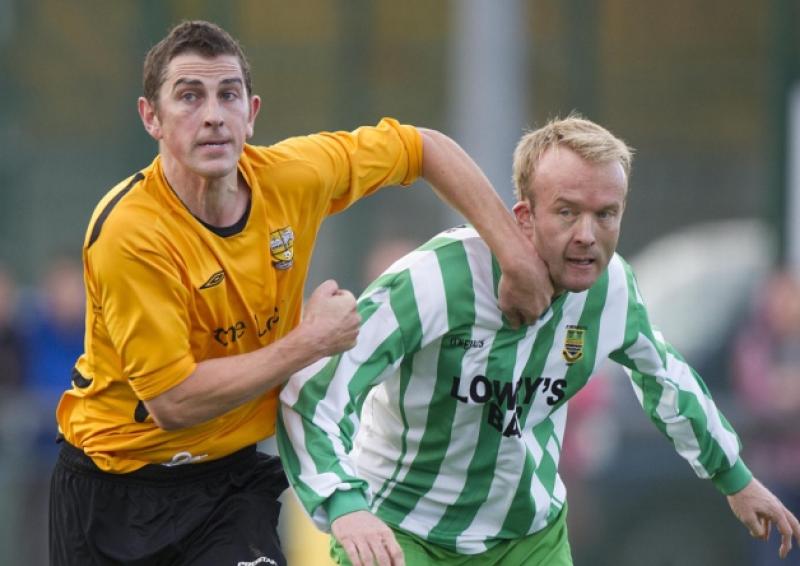 John Shanahan (Clonmel Town) and James Walsh (St. Michael's) during Sunday's Premier League tie at the Dr Pat O'Callaghan Complex in Clonmel. Saints won the game by 2-1.
