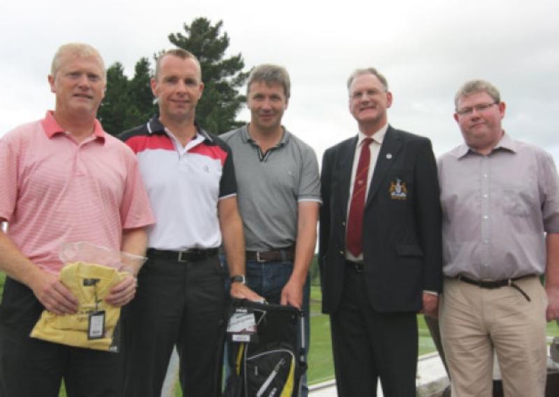 CLONMEL GOLF CLUB:Prizewinners in the recent John Kennedy Motors Ltd 18 holes stableford competition were from left: John O'Brien (best gross), Tom Duggan, overall winner with 41 points; John Kennedy of John Kennedy Motors (competition sponsors), Jimmy Cass, Captain of Clonmel Golf Club; James Kearns, Best Sunday.