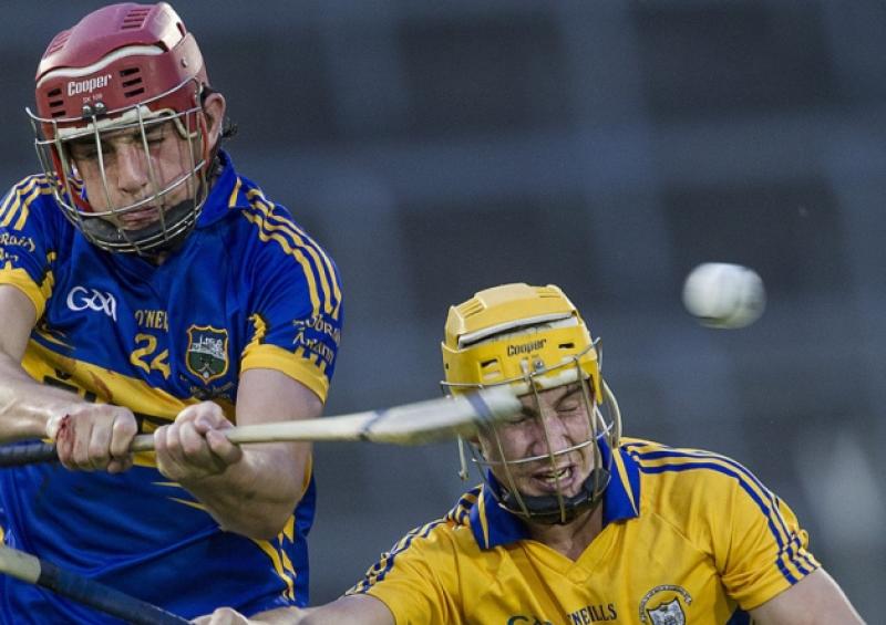challenged by Clare's Colm Galvin.