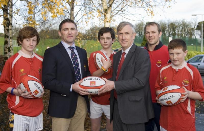 Barry Maher, Chairman Cashel RFC presenting a set of jerseys and rugby balls to Eddey Morrissey, Principal CCS in a gesture to  help develop the game in the school. L/R: Padraig Hickey, Barry Maher, John Purdue, Eddie Morrissey, John Ed O'Connor, (Teacher) Dean Harding.