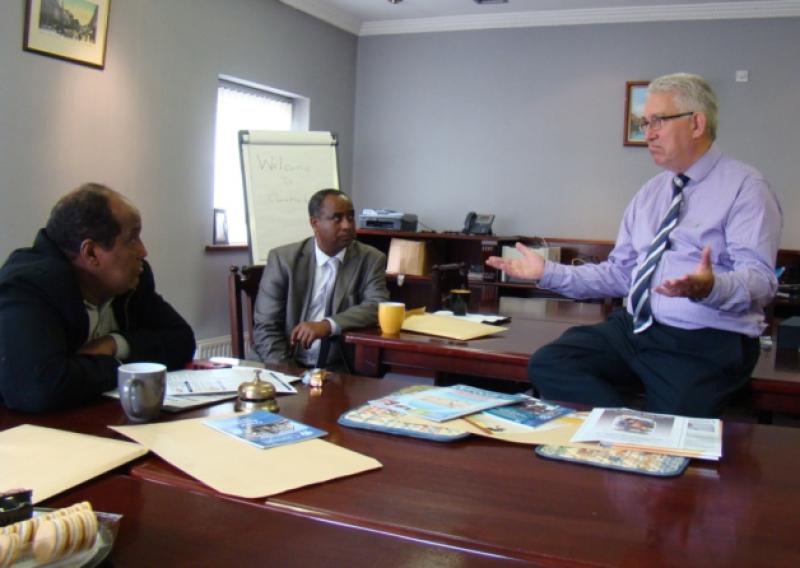 Clonmel Credit Union manager Paul Davey talks to visiting representatives from Europe and Africa about the success of the Clonmel facility.