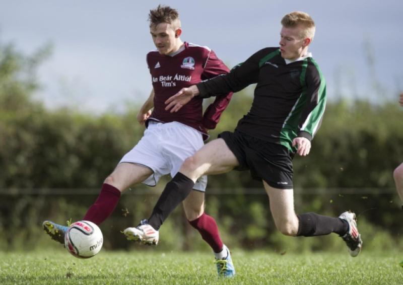 Darren Sweeney (Suirside FC) and Simon Aherne (Clonmel Celtic B) in action during Sunday's Tipperary Cup 1st round tie. Darren Sweeney scored four times for Suirside in their 7-0 swamping of the Clonmel side.