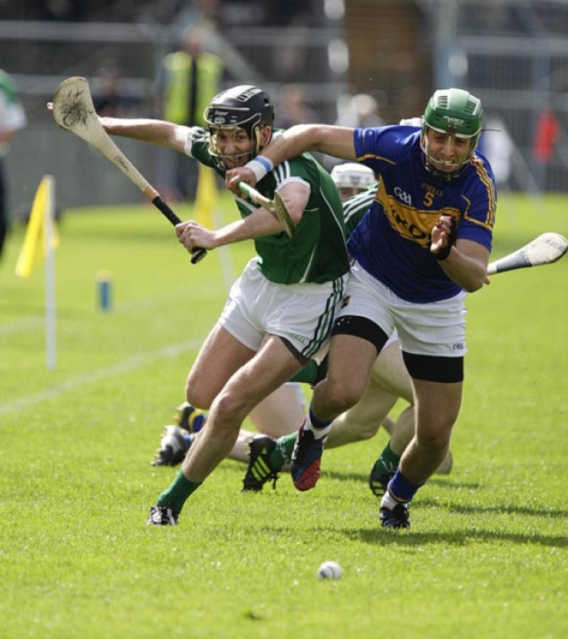 010614  Munster Senior Hurling Championship Semi Final   Tipperary v Limerick.     James Barry Tipperary battles with Limerick's Donal O'Grady.  Photo Andy Jay.