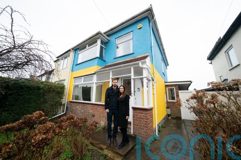 UK couple show support for Ukrainian friends by painting house in flag colours