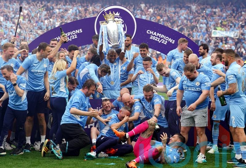 Man City take title in dramatic fashion