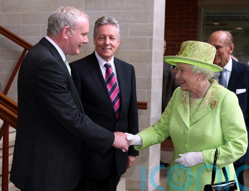 Martin McGuinness and Queen Elizabeth II handshake was 'quite long', says photographer