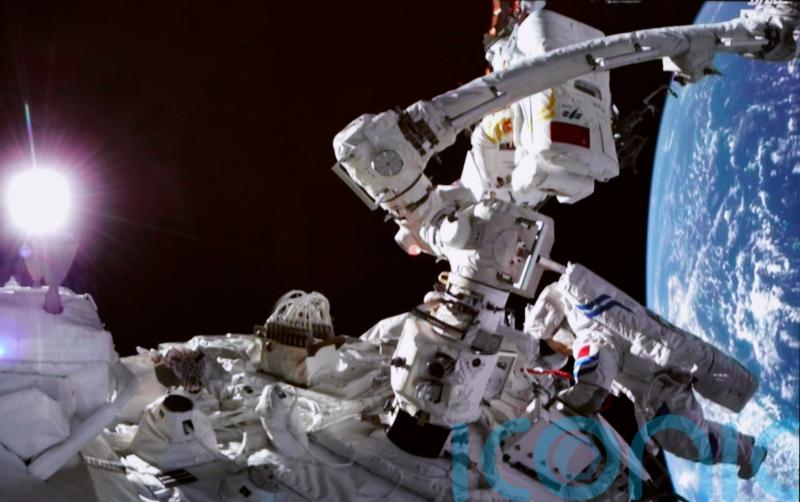 Two Chinese astronauts complete spacewalk from new space station