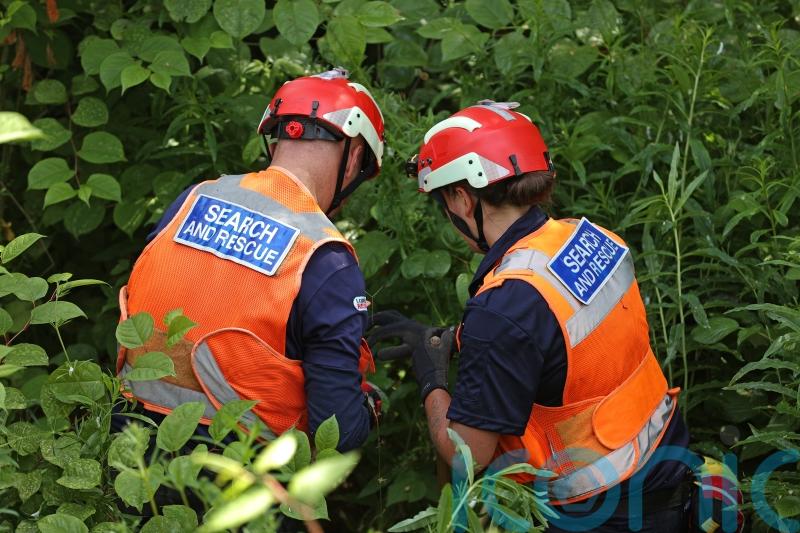 Second man arrested as search for missing woman continues