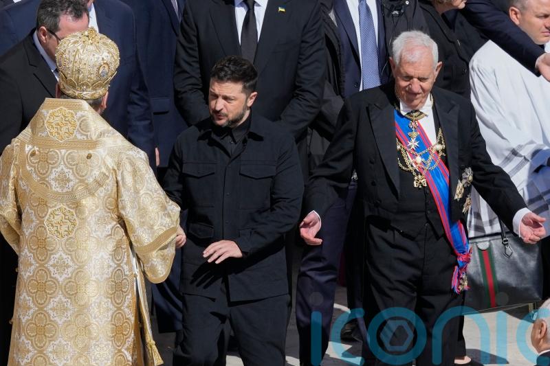 Zelensky appears to receive applause as leaders gather for Pope’s funeral