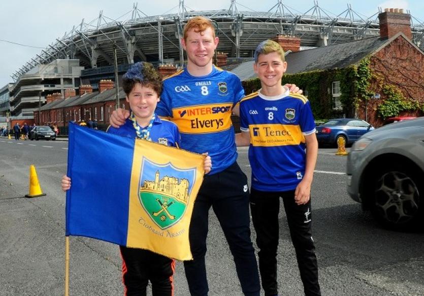 Paul, Neill and Liam Ryan of Cahir cheering on the Premier County. Photo  by Eamonn McGee