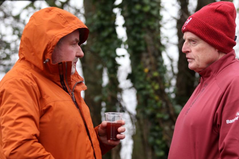 Johnny Cavanagh and Seanie McCullough chat after completing the Christmas Season swim in Youghal Quay.  Picture: Bridget Delaney