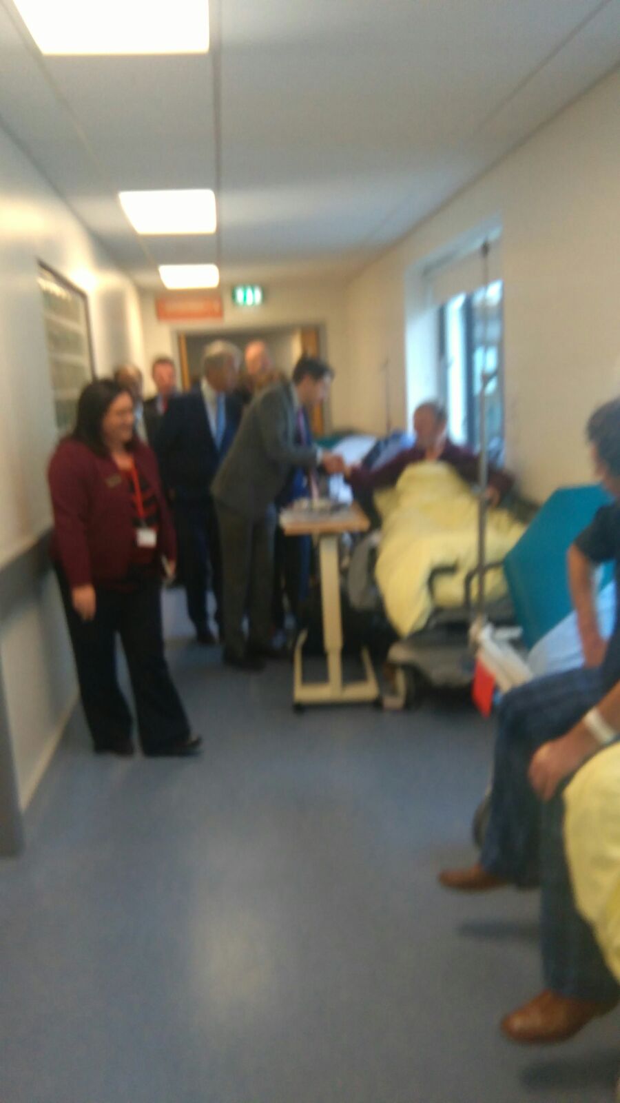 Minister Harris meets patients on trolleys