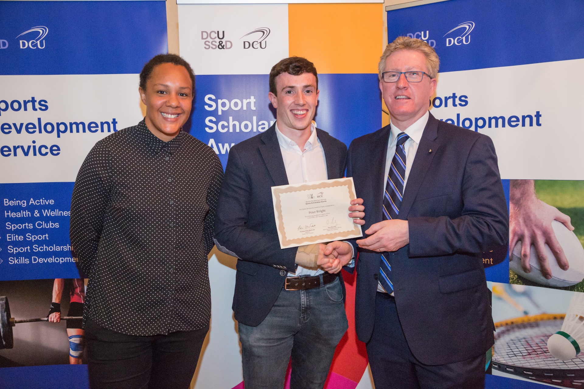 Peter Wright Professor Daire Keogh, Deputy President of DCU and Sophie Spence, Rugby Development Officer.