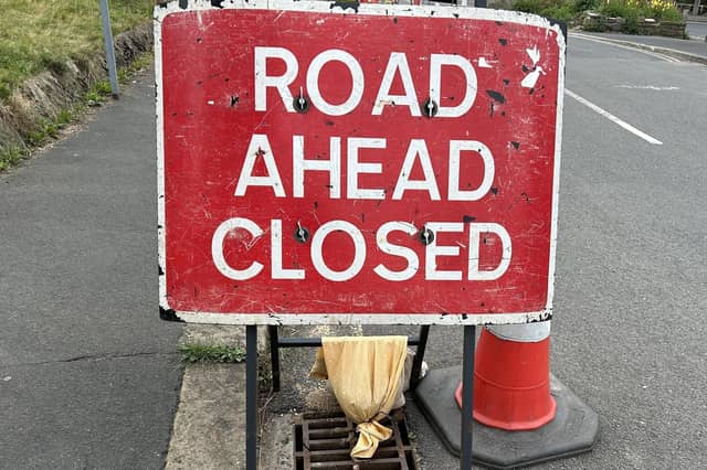 Road closure sign